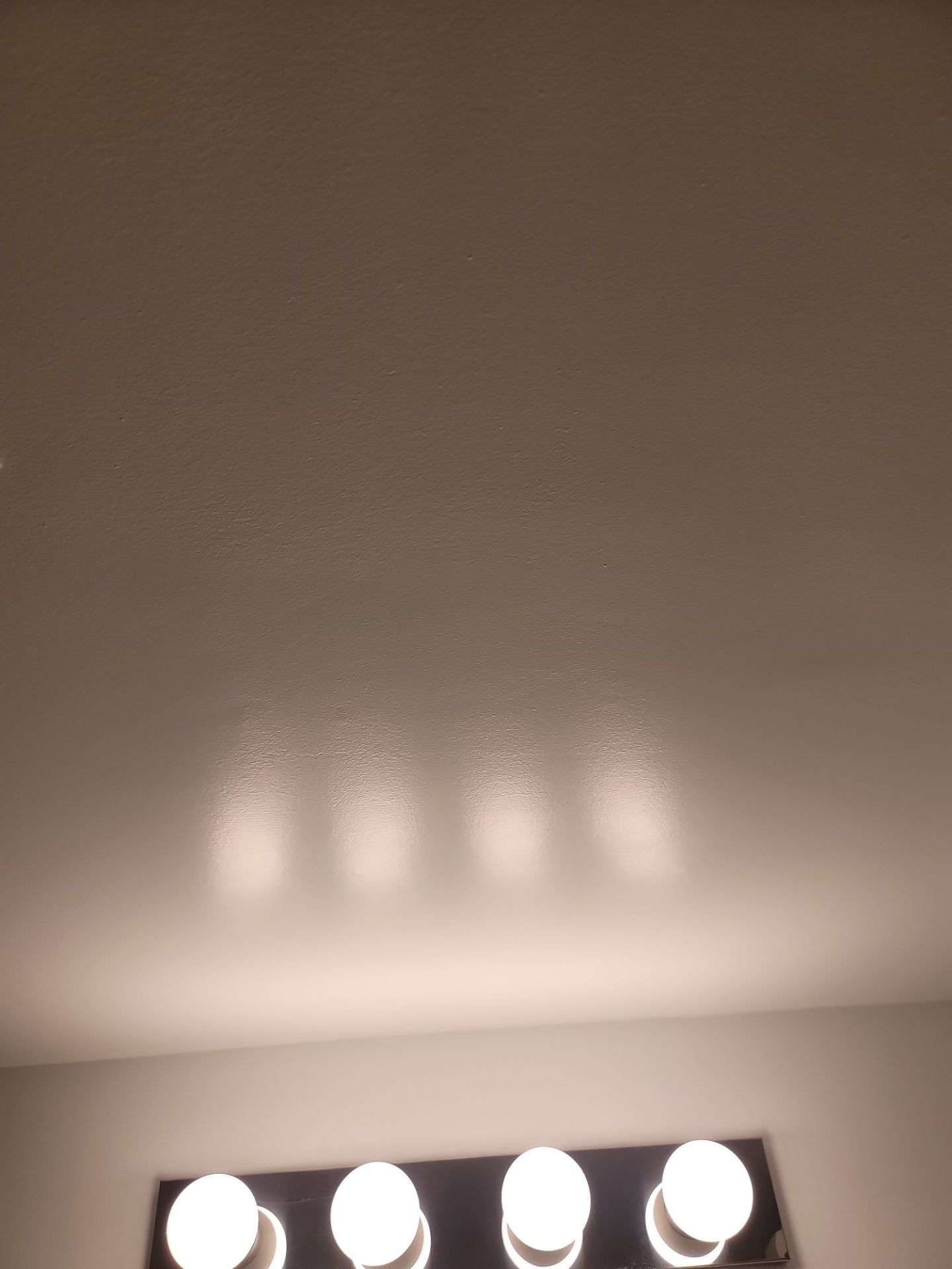 Smooth repaired ceiling after drywall restoration — ceiling repair GTA
