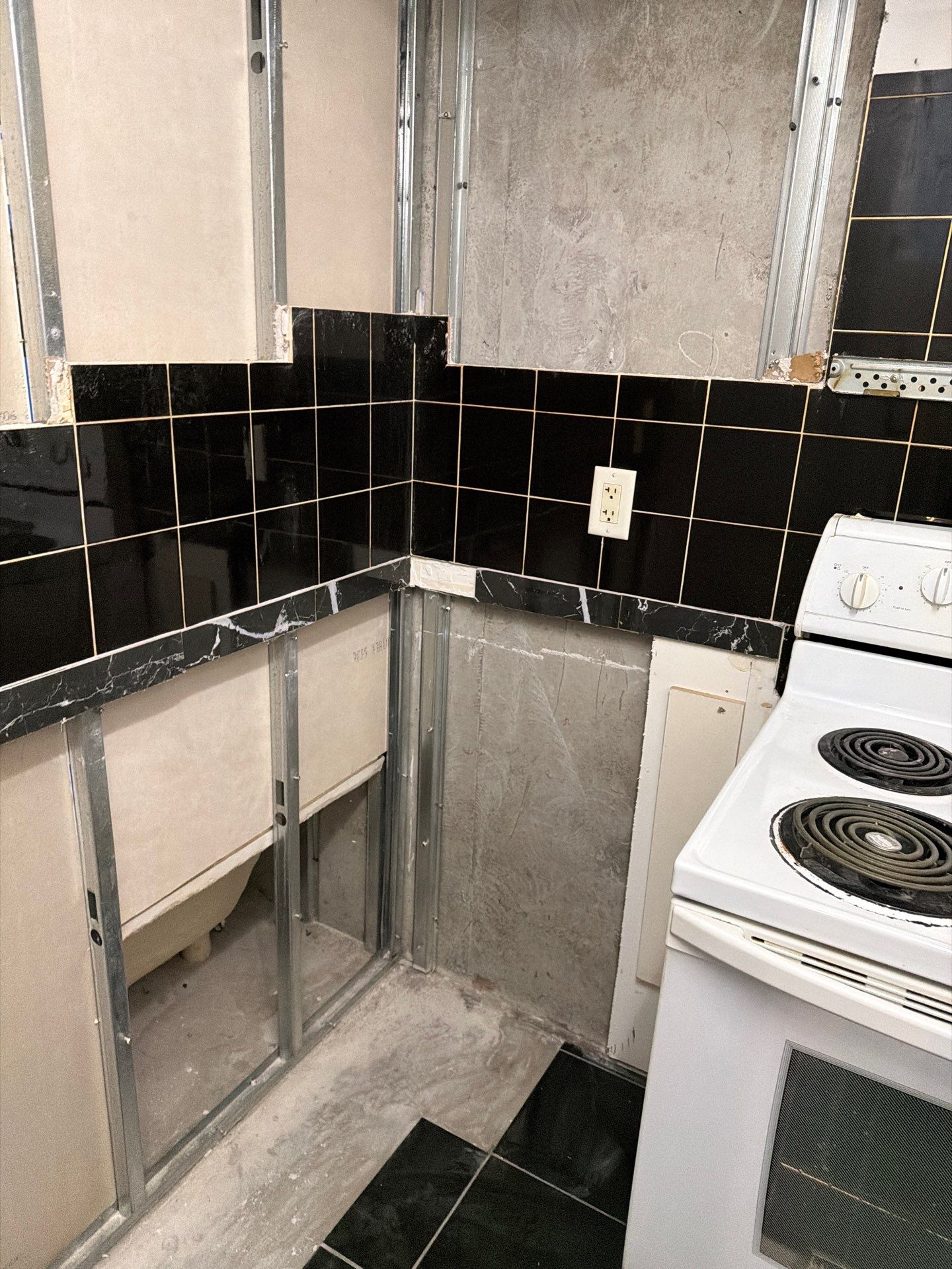 Kitchen framing and drywall demolition stage — rebuild services GTA