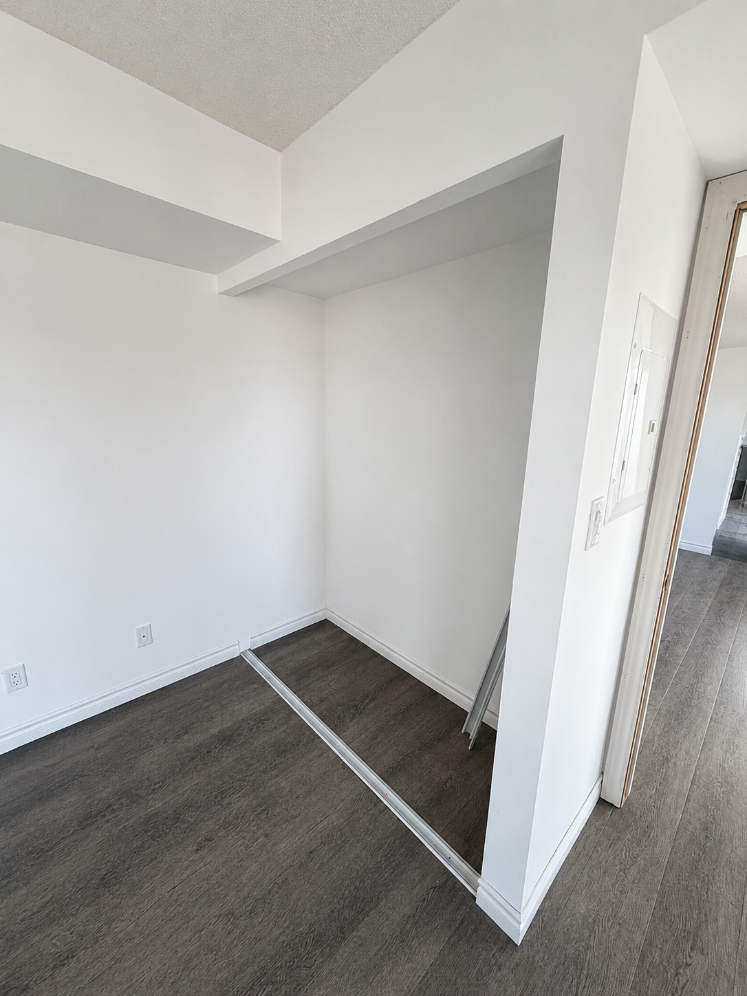 Finished condo unit after rebuild — drywall repair and flooring GTA