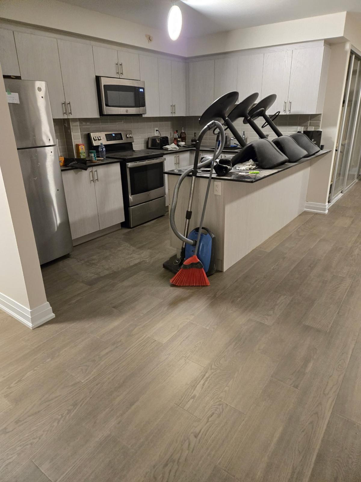 Restored kitchen and flooring after water damage repair — condo repair services GTA