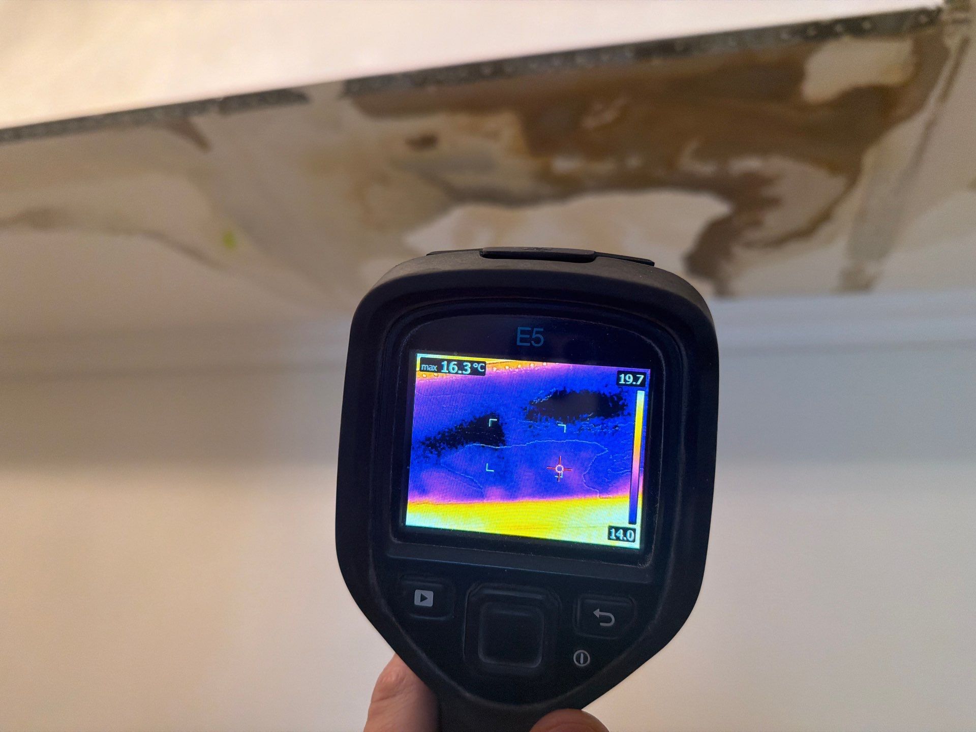 Thermal camera inspection showing moisture in ceiling — water damage detection GTA